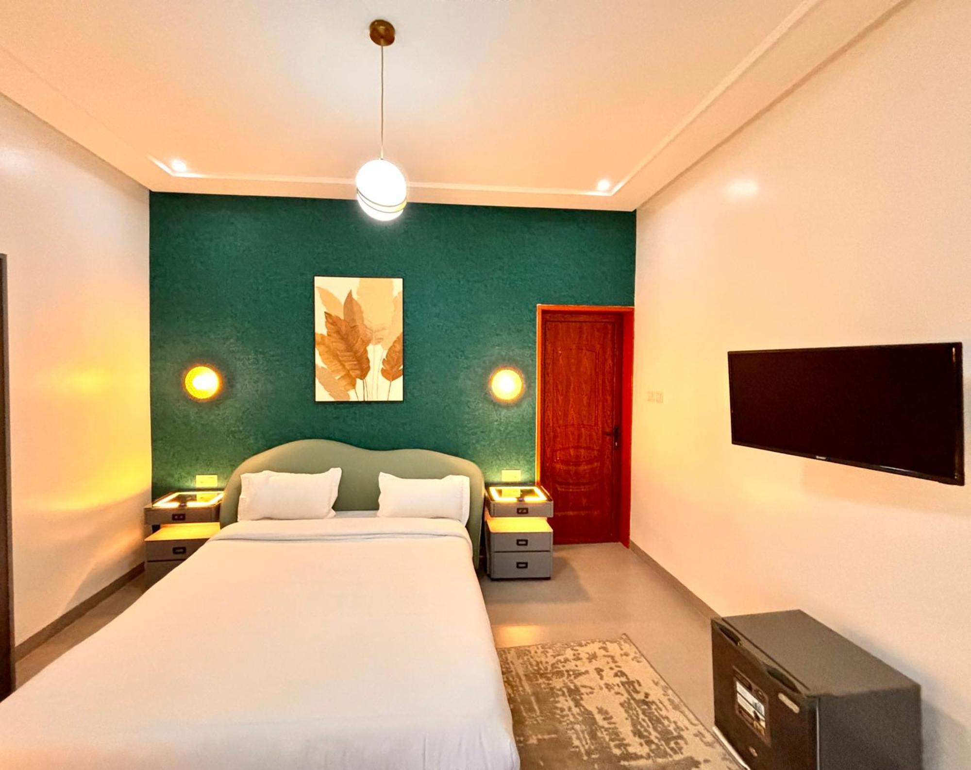 داكاغْ Lighthouse Signature Suites الغرفة الصورة